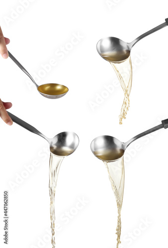 Dipper pouring noodle soup on white background, Soup for sukiyaki from chicken and fish