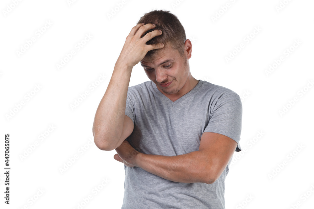 Photo of young loser man with bristle and palm on head Photo of young loser man with bristle and palm on head