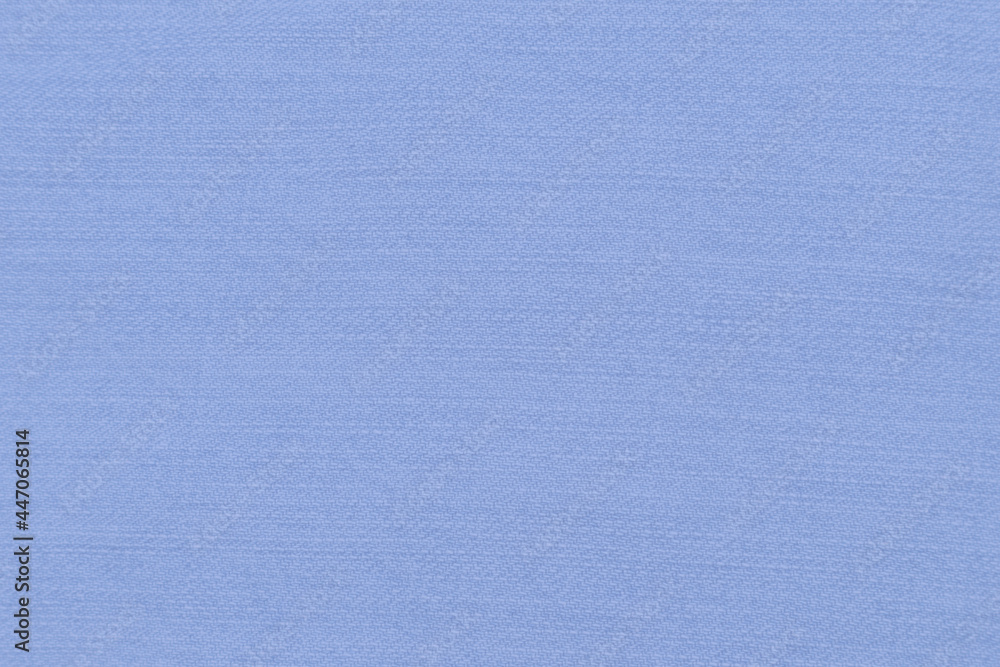 Light blue background with a light cotton fabric texture Light blue background with a light cotton fabric texture