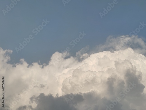 sky with heavy clouds and glare of sun.