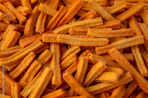 Salted, spicy crispy chips made from corn or wheat flour. Beer snack.