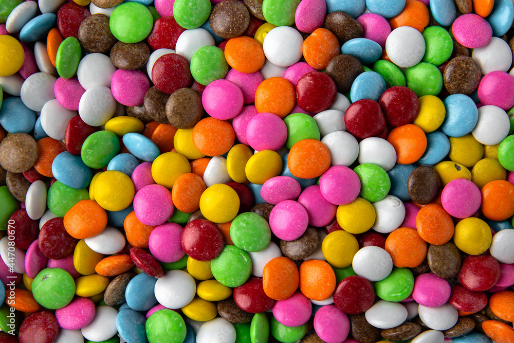 Candies. Glazed hazelnuts or almonds. Desserts for candy bars. Small multicolored dragees. Candies. Glazed hazelnuts or almonds. Desserts for candy bars. Small multicolored dragees.