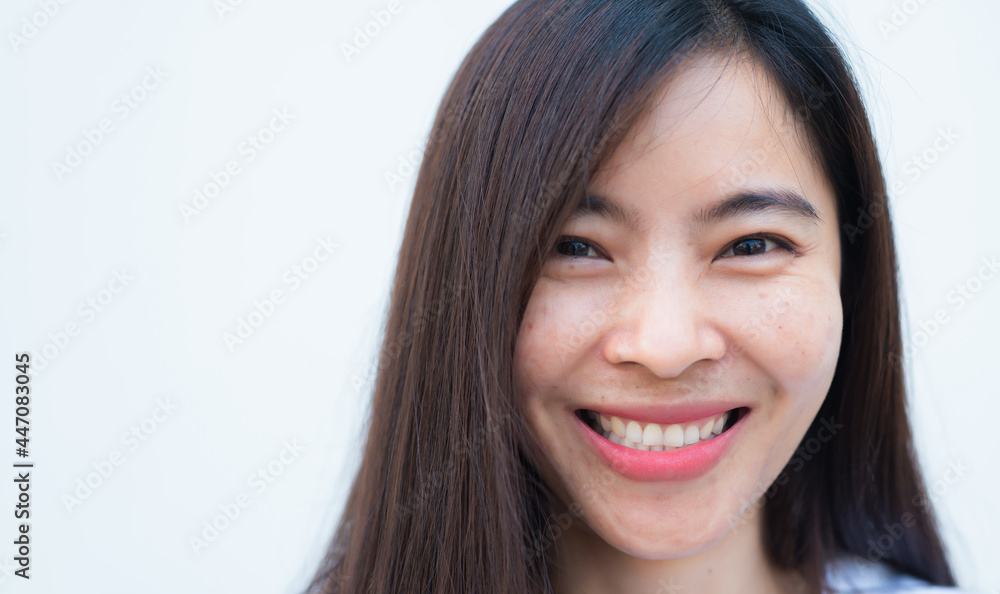 close up attractive adult business woman asian girl with happy and smile against white concrete wall office. close up attractive adult business woman asian girl with happy and smile against white concrete wall office.