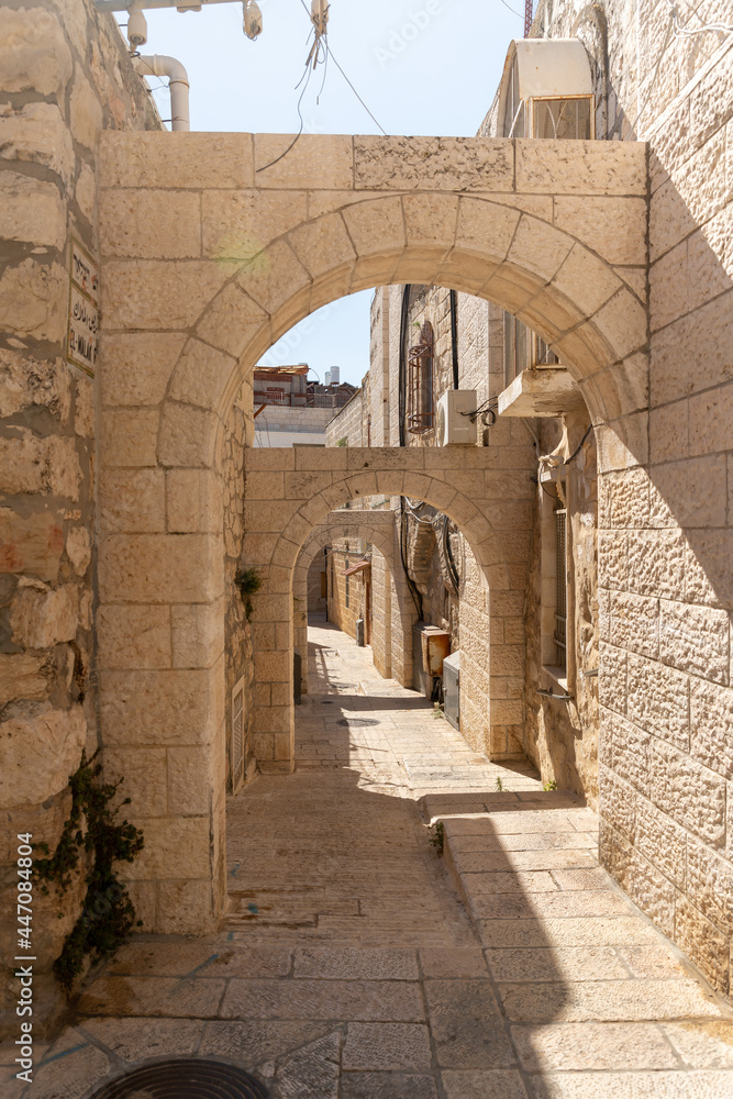 Stone  arched connections on the quiet small Ararat Street in the Armenian quarter in the old city of Jerusalem, Israel