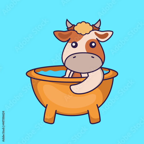 Cute cow taking a bath in the bathtub.