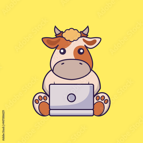 Cute cow using laptop.