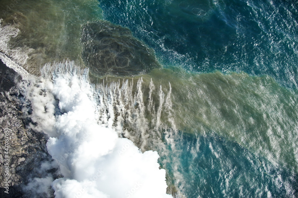 Hawaii. Volcanic eruption. Fiery lava flows into the ocean Hawaii. Volcanic eruption. Fiery lava flows into the ocean