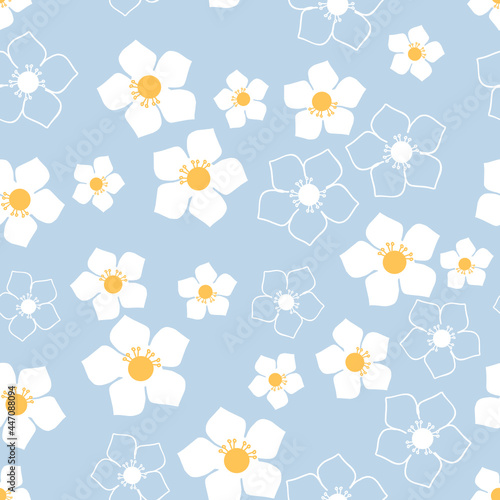 Seamless pattern with little white flower on blue background vector illustration.