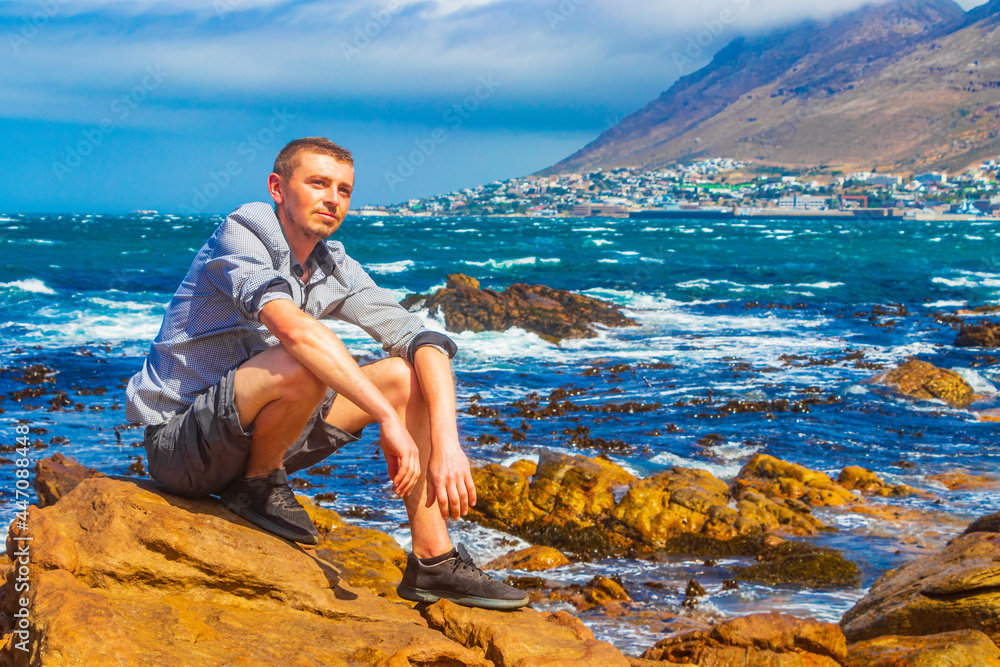 Male model tourist traveler coast landscape Cape Town South Africa.