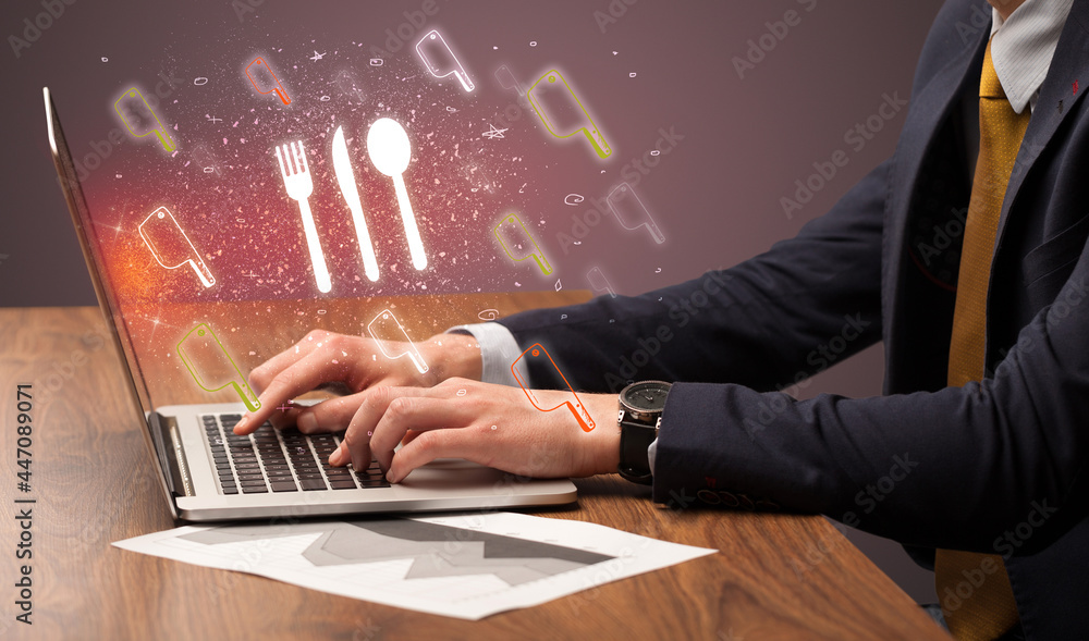 Hand searching for recipes on the internet Hand searching for recipes on the internet
