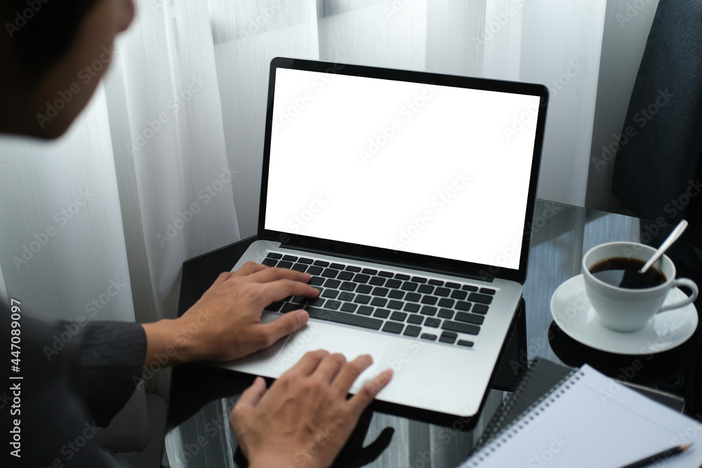 Closed up with businessman in suit outfit working with laptop, empty display of laptop. Closed up with businessman in suit outfit working with laptop, empty display of laptop.