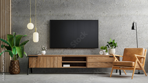 Living room interior have tv cabinet and leather armchair in cement room with concrete wall. photo