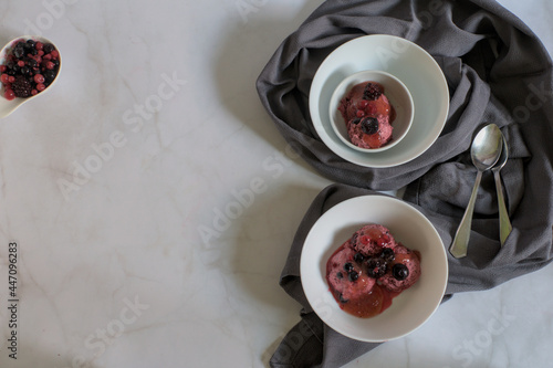 Bowl with forest fruits ice cream, bowls with ice cream and bowl with frozen forest fruits