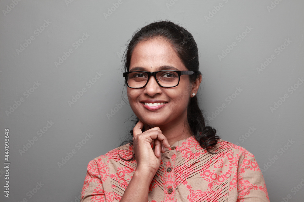 Portrait of a happy smiling woman of Indian ethnicity 
