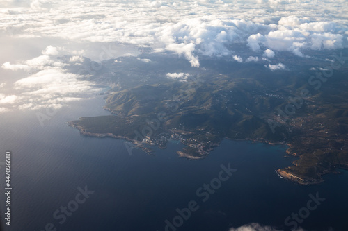 Sky view of Ibiza island, aerial view of Ibiza with clouds