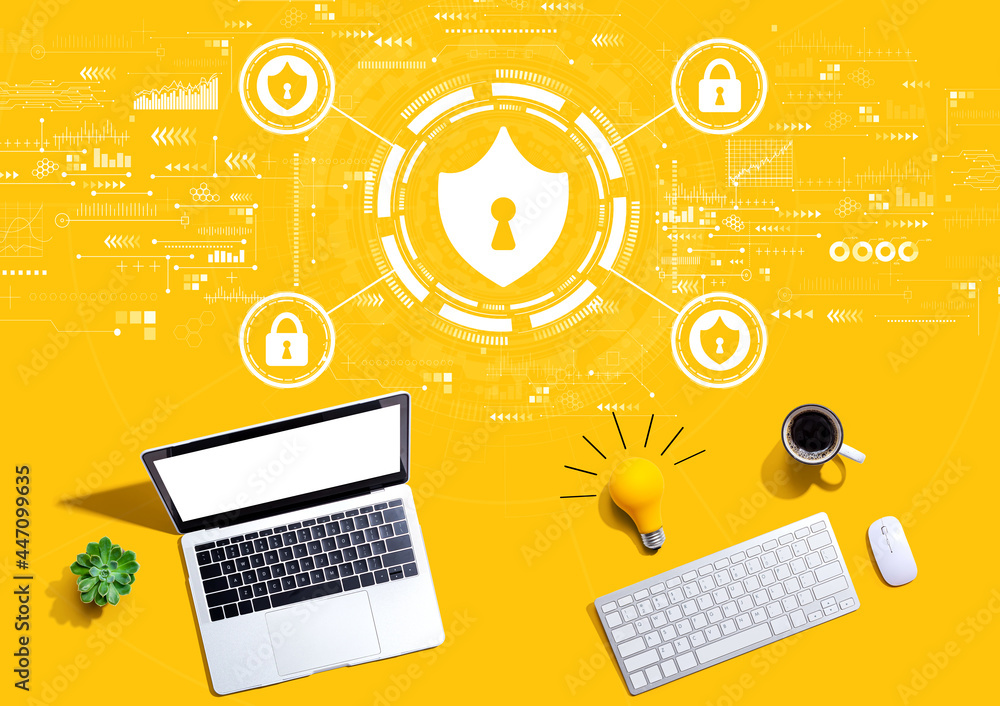 Cyber security theme with computers with a light bulb Cyber security theme with computers with a light bulb