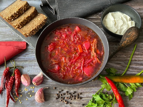 Ukrainian borscht with meat and homemade sour cream	