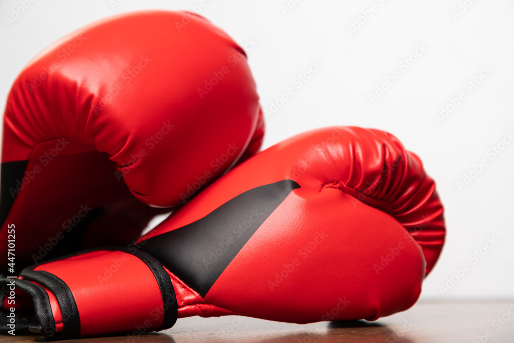 Close-up of pair of red leather boxing gloves