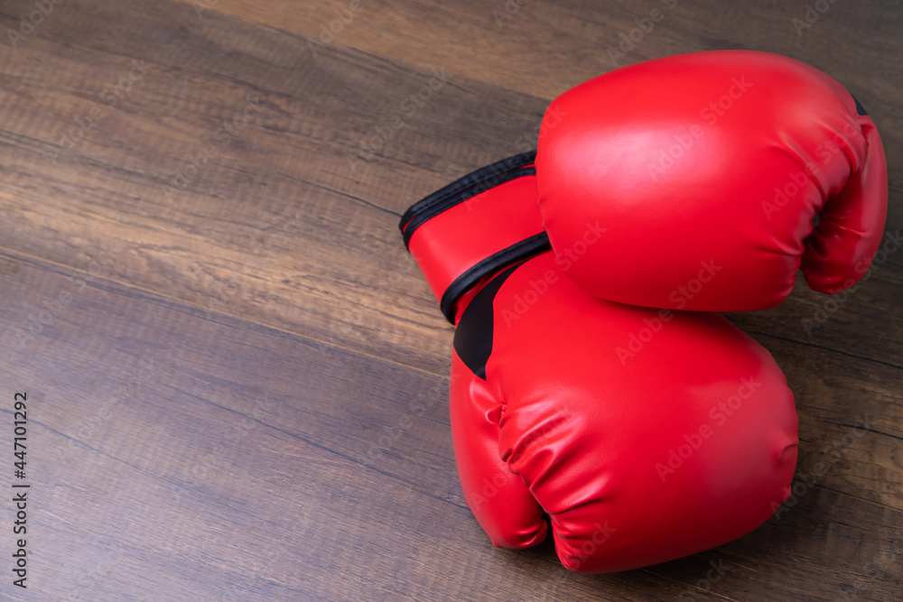 Close-up of pair of red leather boxing gloves