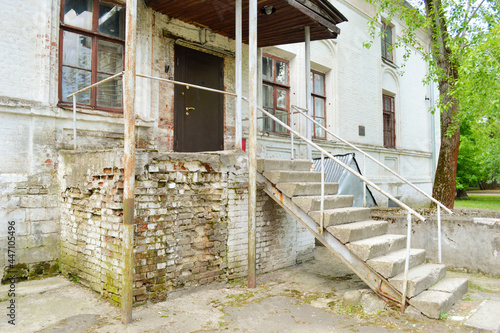 Wallpaper Mural Facade of an old brick building with a staircase Torontodigital.ca