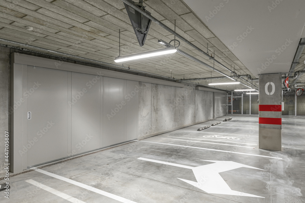 custom made wallpaper toronto digitalEmpty public underground parking lot or garage interior with concrete stripe painted columns and signs