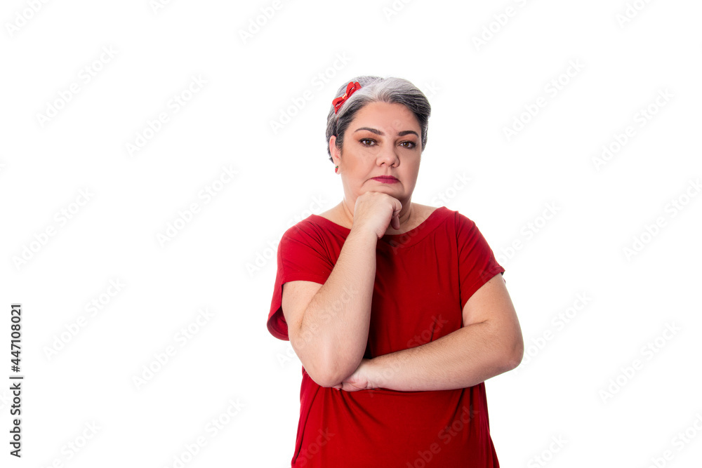young lady wearing red outfit on white background with hand on chin thoughtful. young lady wearing red outfit on white background with hand on chin thoughtful.