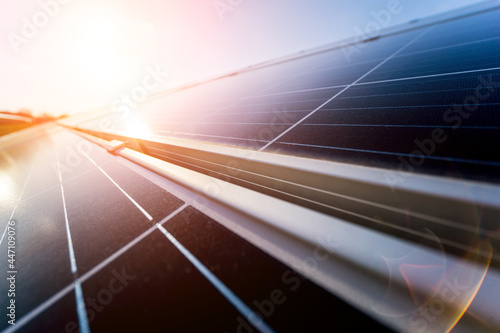 Photovoltaic solar panels on blue sky background