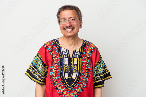 Senior indian man wearing a Indian costume isolated on white background happy, smiling and cheerful.