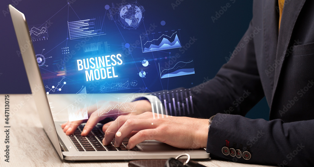 Businessman working on laptop, business concept Businessman working on laptop, business concept