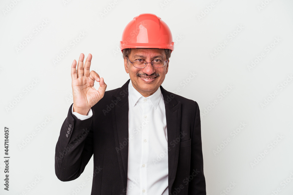 Middle aged indian architect man isolated on white background cheerful and confident showing ok gesture.