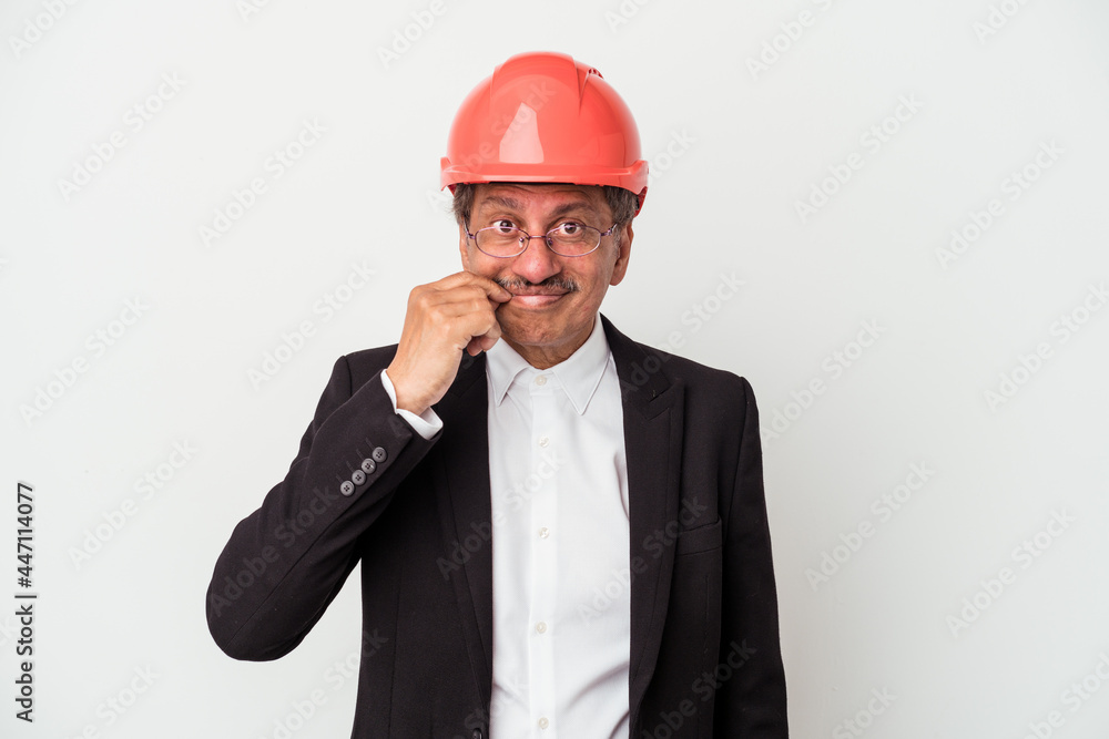 Middle aged indian architect man isolated on white background with fingers on lips keeping a secret. Middle aged indian architect man isolated on white background with fingers on lips keeping a secret.