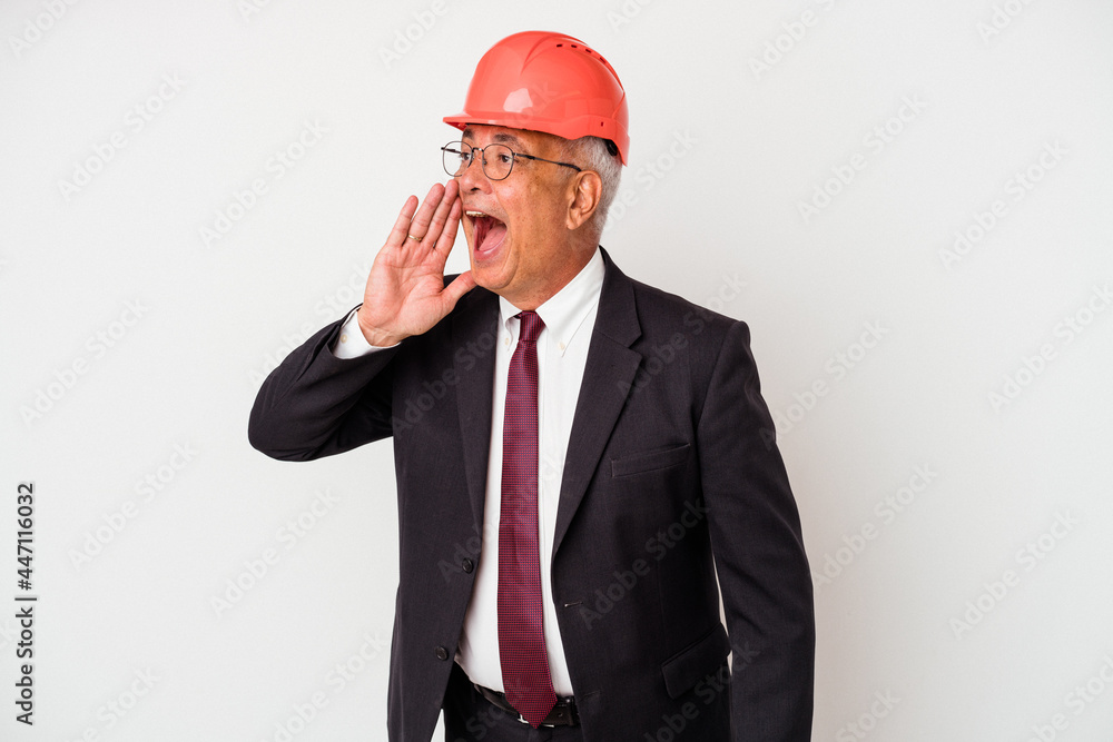 Senior american arquitech man isolated on white background shouting and holding palm near opened mouth. Senior american arquitech man isolated on white background shouting and holding palm near opened mouth.