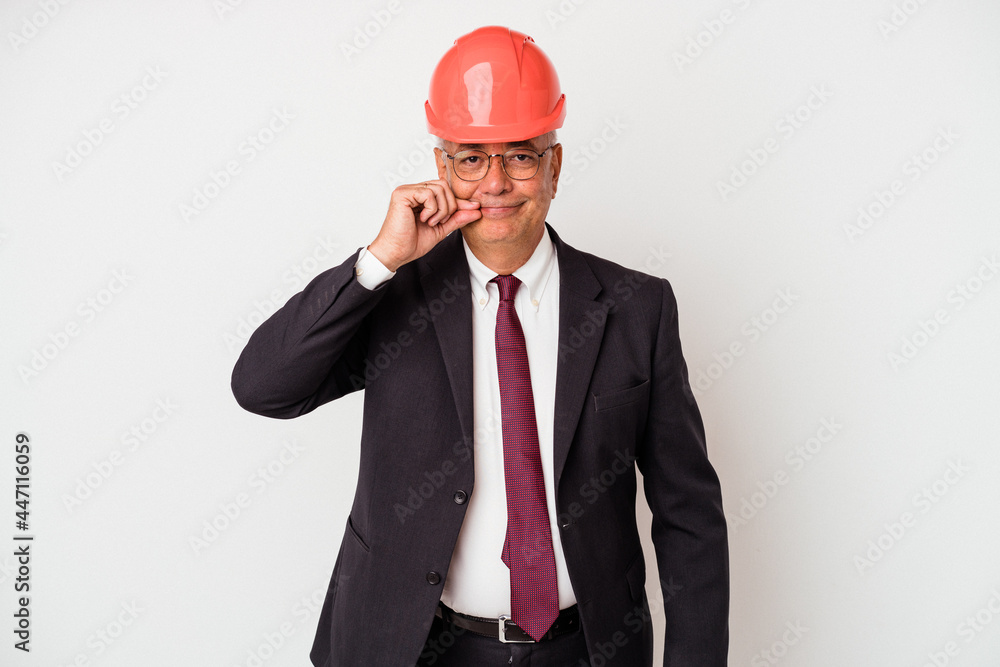Senior american arquitech man isolated on white background with fingers on lips keeping a secret. Senior american arquitech man isolated on white background with fingers on lips keeping a secret.