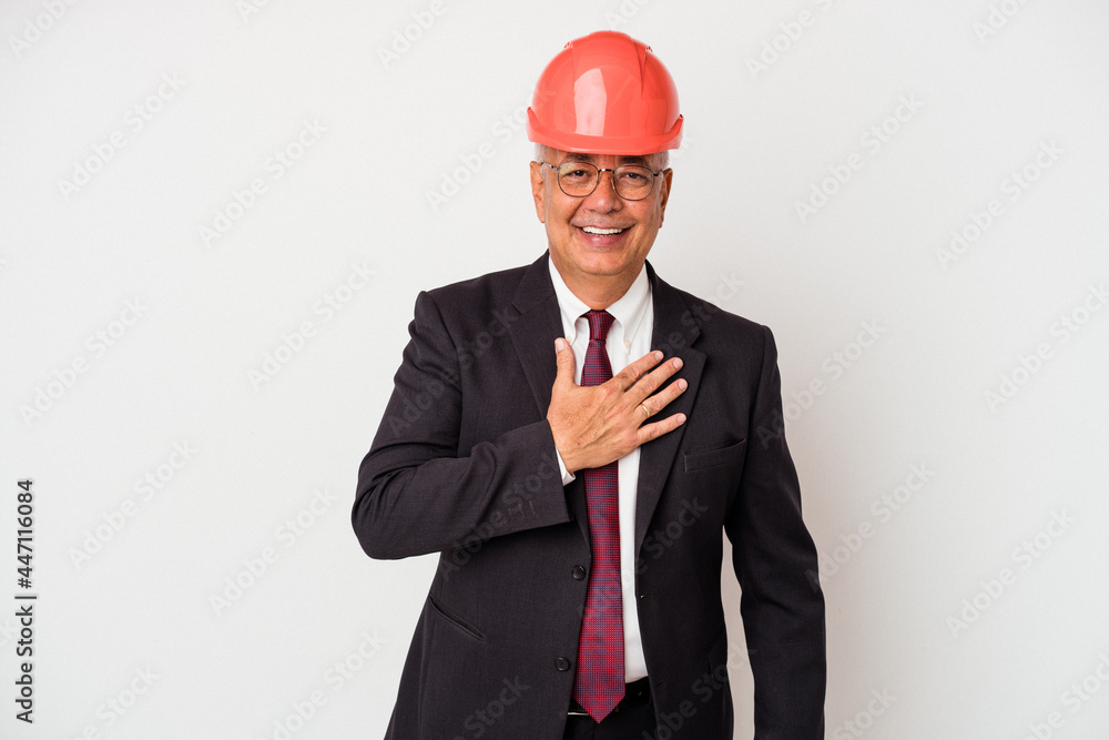 Senior american arquitech man isolated on white background laughs out loudly keeping hand on chest. Senior american arquitech man isolated on white background laughs out loudly keeping hand on chest.