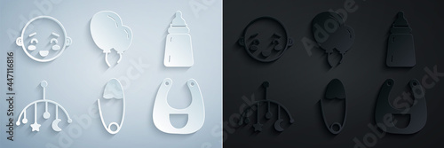 Set Classic steel safety pin, Baby bottle, crib hanging toys, bib, Balloons with ribbon and Happy little boy head icon. Vector