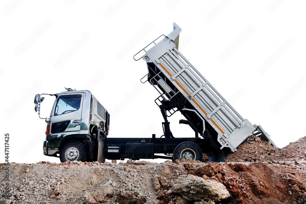 The dump truck is pouring soil out of the pickup truck. isolated on white background.
