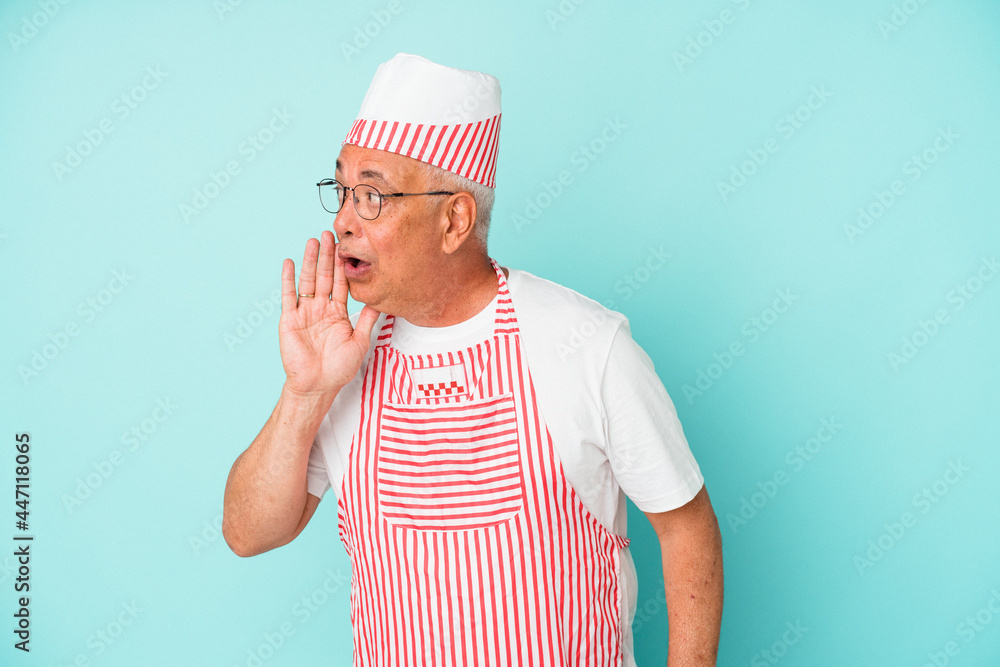 Senior american ice cream man woman holding isolated on blue background is saying a secret hot braking news and looking aside Senior american ice cream man woman holding isolated on blue background is saying a secret hot braking news and looking aside
