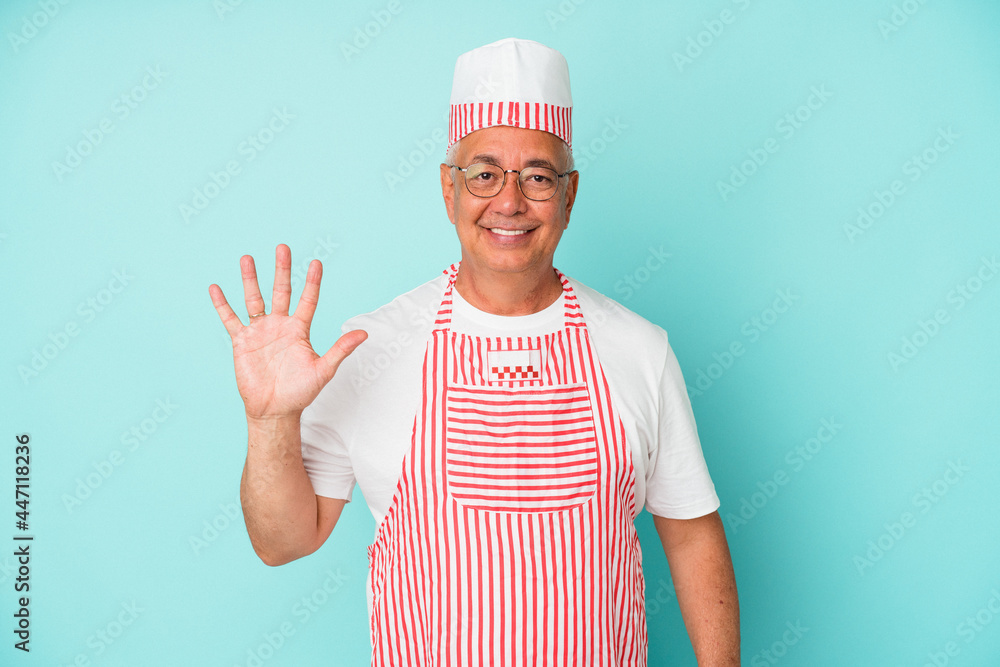 Senior american ice cream man woman holding isolated on blue background smiling cheerful showing number five with fingers. Senior american ice cream man woman holding isolated on blue background smiling cheerful showing number five with fingers.