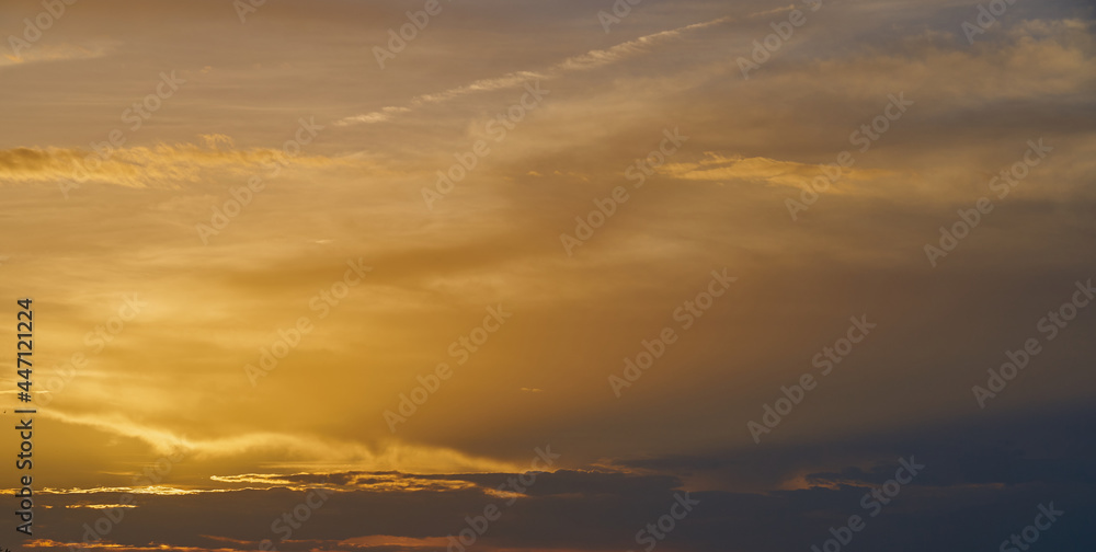 Colorful cloudy sky on the sunset as a natural background.