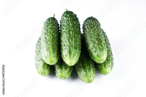 Set of fresh whole cucumbers isolated on a white background, clipping path. Garden cucumber wallpaper backdrop design