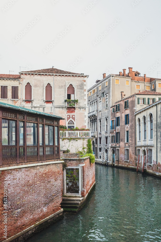 Fototapeta premium Narrow canal by traditional Venetian house, Venice, Italy