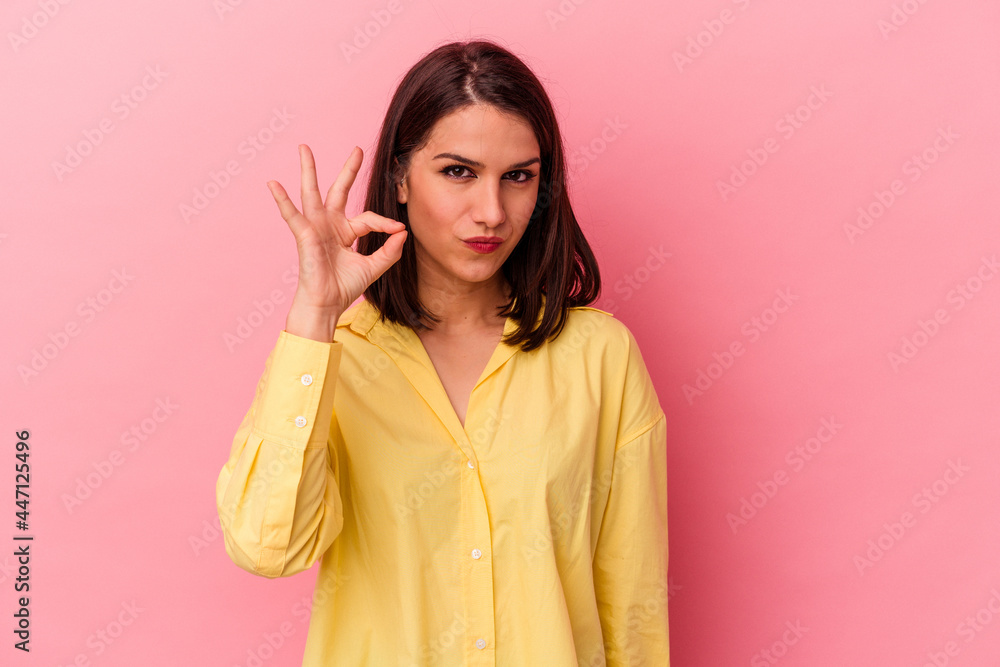 Young caucasian woman isolated on pink background with fingers on lips keeping a secret. Young caucasian woman isolated on pink background with fingers on lips keeping a secret.