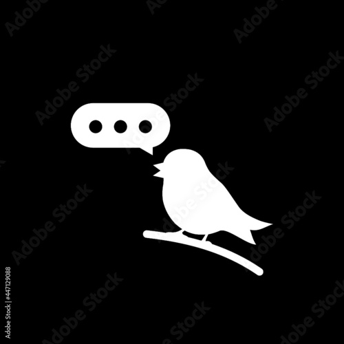 Bird with speech bubble icon isolated on dark background