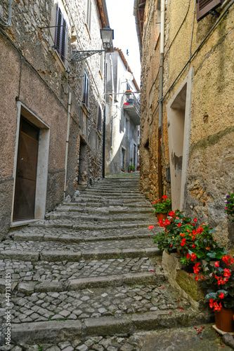 Fototapeta Naklejka Na Ścianę i Meble -  An alley in the medieval quarter of Maenza, a medieval town in the Lazio region. Italy.