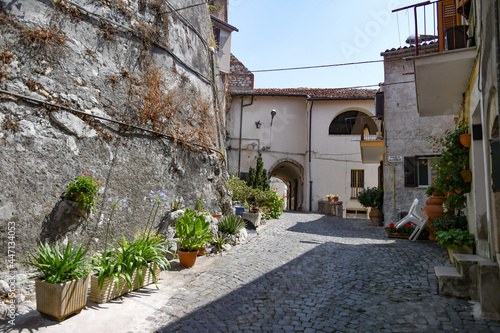 Fototapeta Naklejka Na Ścianę i Meble -  Maenza, Italy, July 24, 2021. A street in the historic center of a medieval town in the Lazio region.