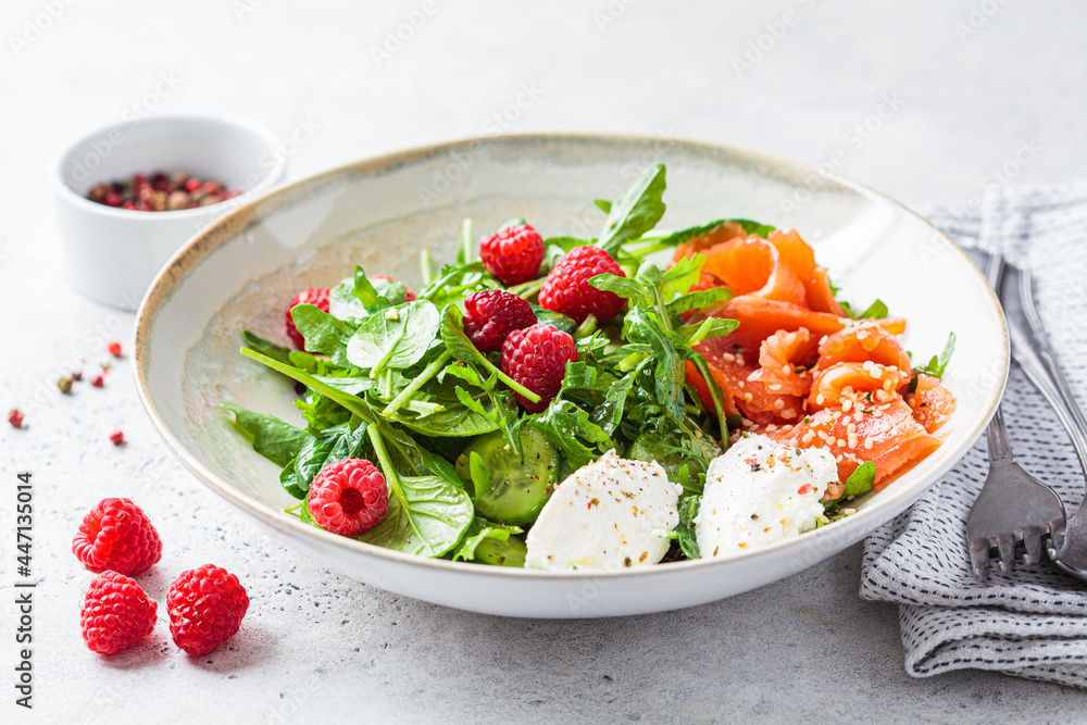 Summer salad with salted salmon, ricotta and raspberries.