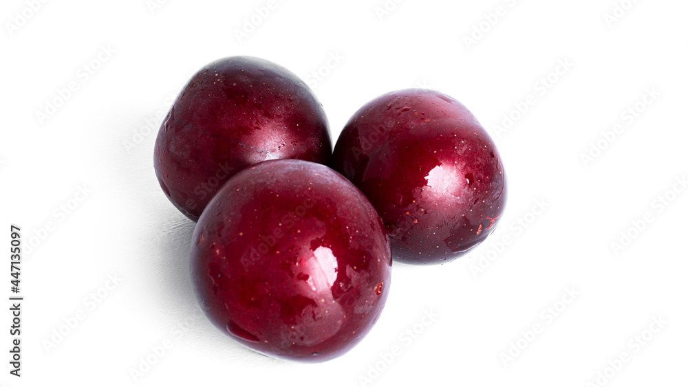 Plums isolated on a white background. Plum fruit.