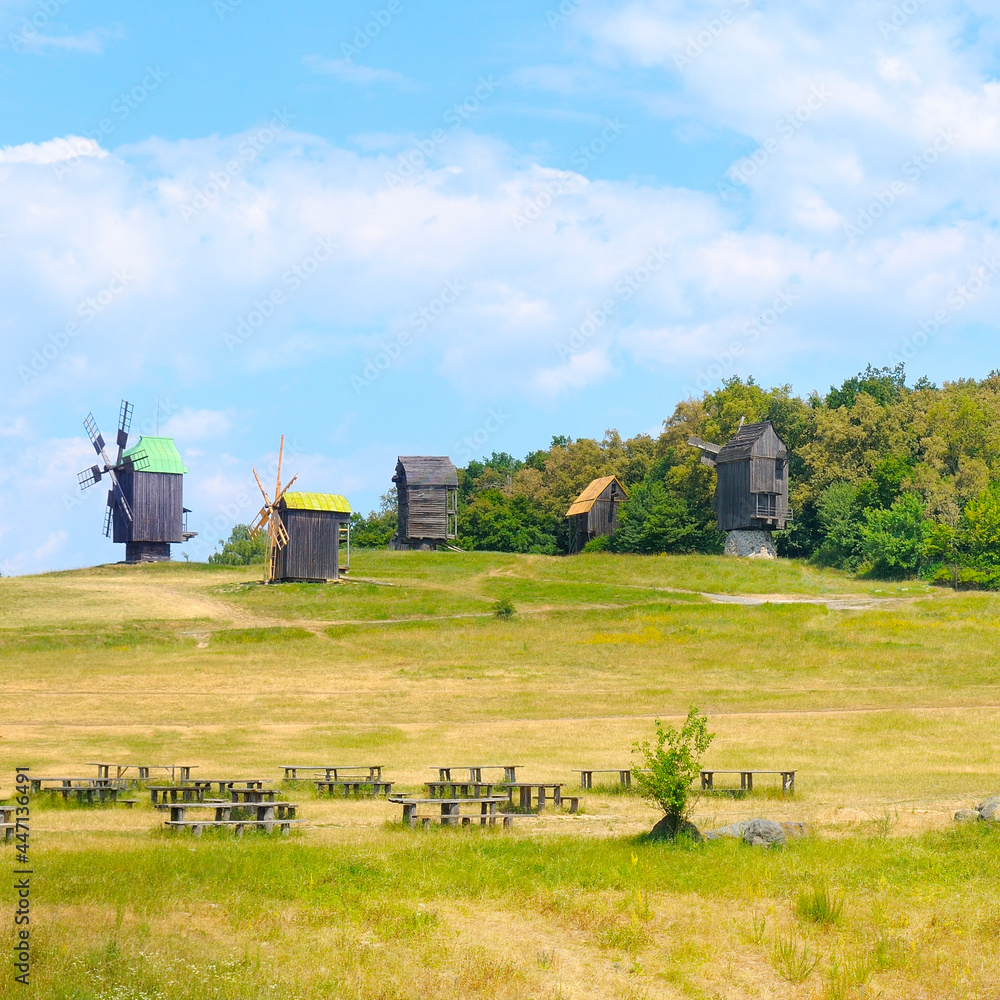 Fototapeta premium Old wooden windmills in the open-air museum. Ukraine.