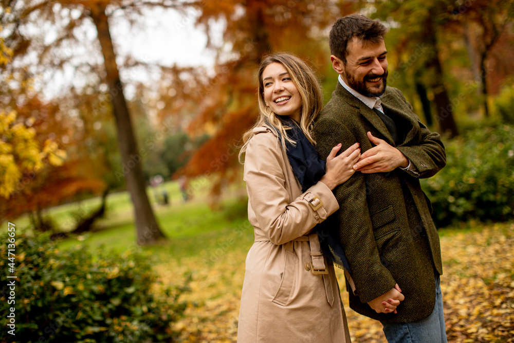 Young couple in the autumn park Young couple in the autumn park