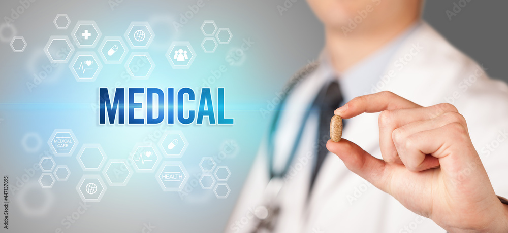Close-up of a doctor giving you a pill Close-up of a doctor giving you a pill
